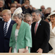 Illustration for article titled Melania Wears a Plate on Her Head
